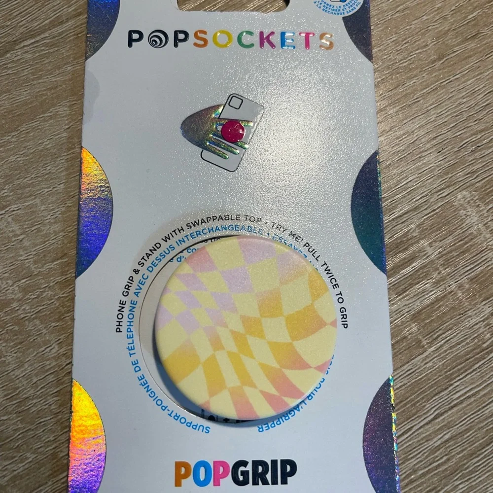 Two Popsockets: One Purple And Pink And One Yellow And Pink (E)